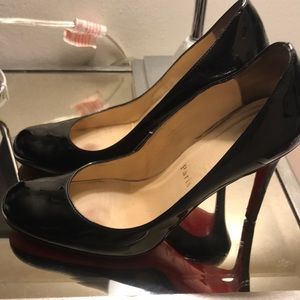 Christian Louboutin black used Heels . 6 1/2 good condition